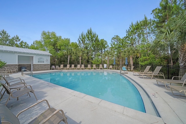 view of pool with a patio