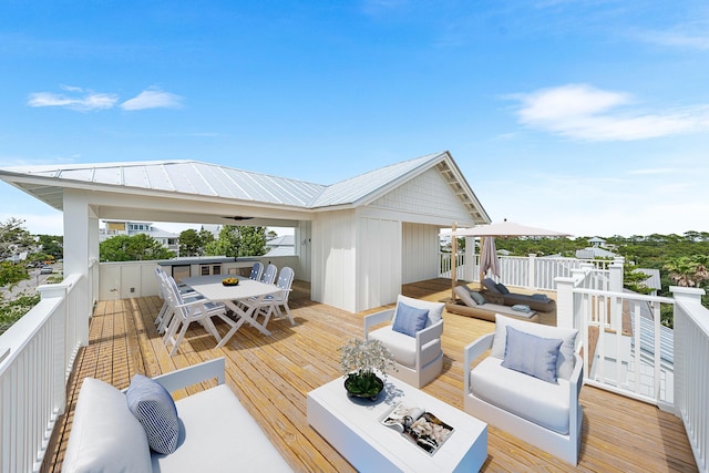 394 Grande Pointe Cir, Inlet Beach, FL 32461 - deck with outdoor dining space and an outdoor living space with a fire pit