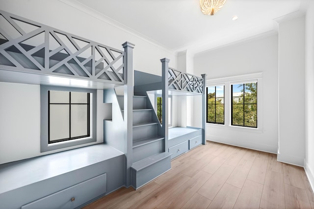 394 Grande Pointe Cir, Inlet Beach, FL 32461 - unfurnished bedroom featuring wood finished floors, ornamental molding, and baseboards