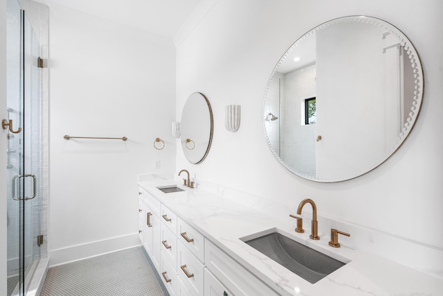 394 Grande Pointe Cir, Inlet Beach, FL 32461 - bathroom featuring double vanity, a stall shower, tile patterned floors, and baseboards