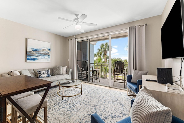 living room featuring ceiling fan