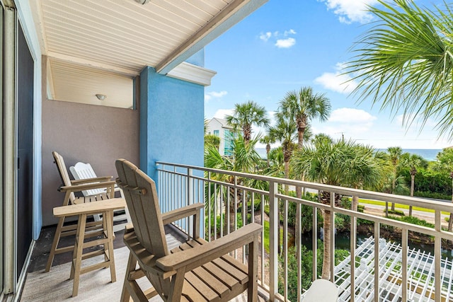 balcony featuring a water view