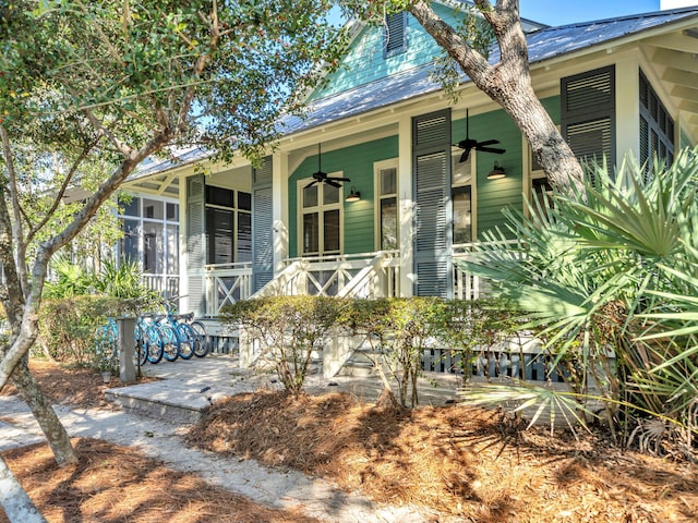 147 Silver Laurel Way, Santa Rosa Beach, FL 32459 - exterior space featuring covered porch, a ceiling fan, and metal roof