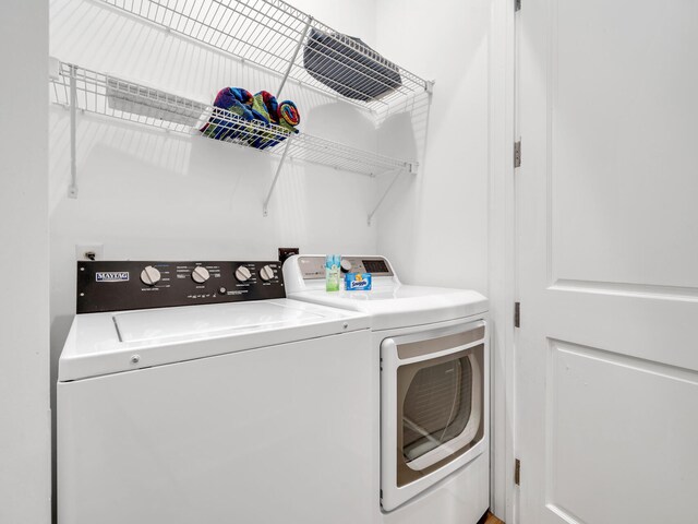 147 Silver Laurel Way, Santa Rosa Beach, FL 32459 - laundry room with laundry area and washing machine and dryer