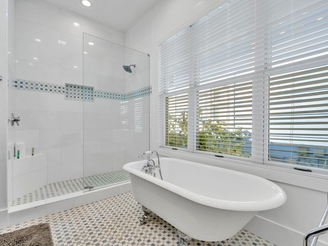 147 Silver Laurel Way, Santa Rosa Beach, FL 32459 - full bathroom featuring a soaking tub, a shower stall, and recessed lighting