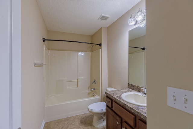 full bathroom featuring vanity, a textured ceiling, tile patterned flooring, shower / bathing tub combination, and toilet