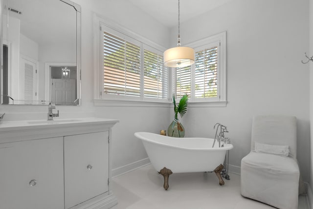 bathroom with vanity and a bathing tub