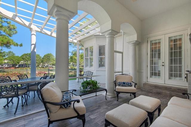 view of patio / terrace with french doors, a pergola, and a deck