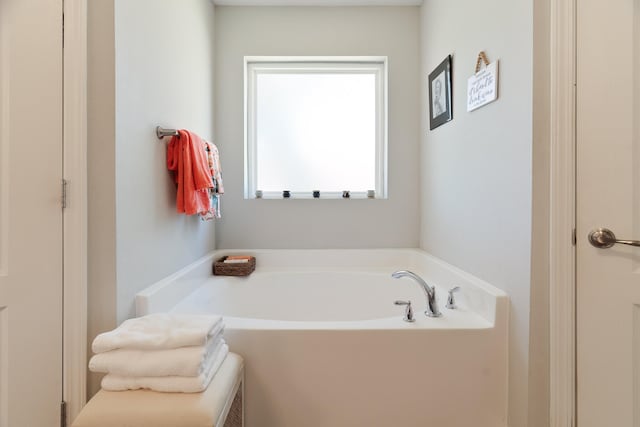 bathroom featuring a tub