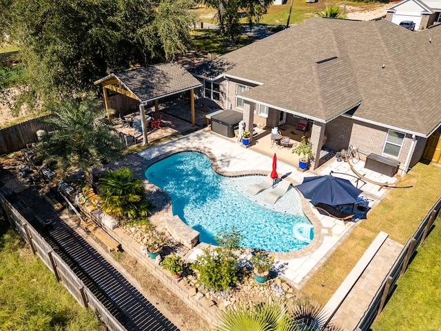 view of pool with a gazebo, a yard, and a patio