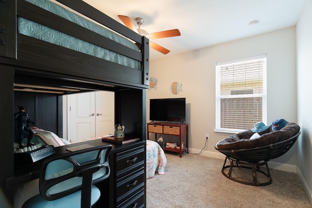 bedroom featuring a closet, carpet floors, and ceiling fan