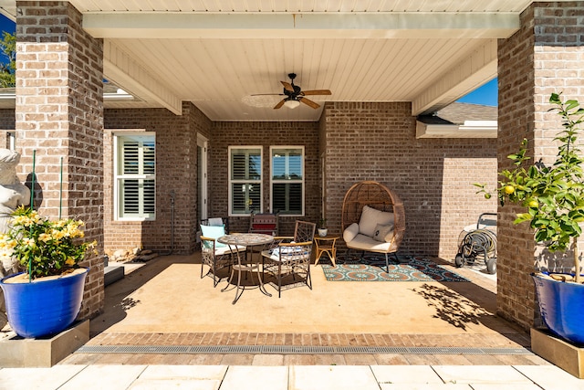 view of patio / terrace featuring ceiling fan