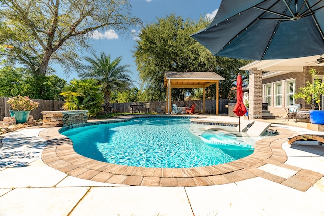 view of pool with french doors, ceiling fan, a patio, and a jacuzzi