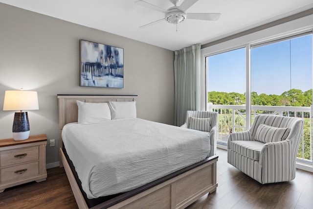 bedroom featuring ceiling fan and dark hardwood / wood-style floors