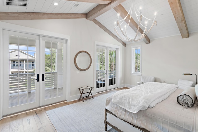 bedroom featuring french doors, multiple windows, and access to outside