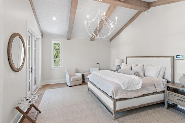 bedroom with a notable chandelier, light wood-type flooring, vaulted ceiling with beams, and wooden ceiling