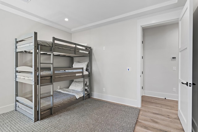 unfurnished bedroom featuring hardwood / wood-style floors