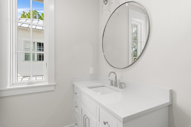 bathroom featuring vanity and plenty of natural light