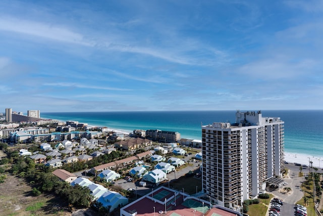 drone / aerial view featuring a view of the beach and a water view