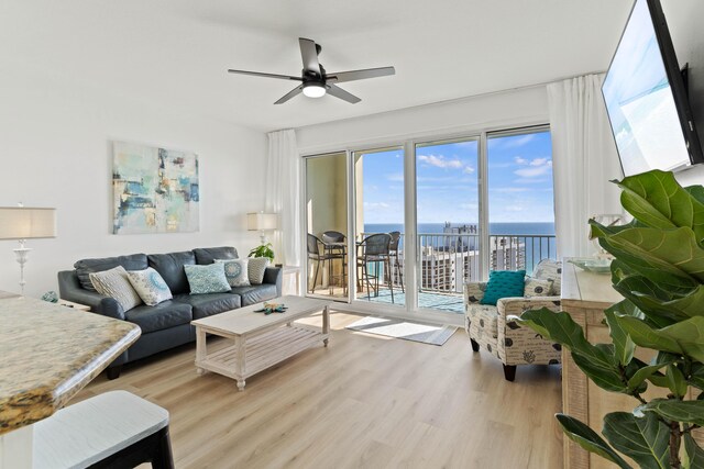 112 Seascape Dr Unit 2105, Miramar Beach, FL 32550 - living room with a ceiling fan and light wood finished floors