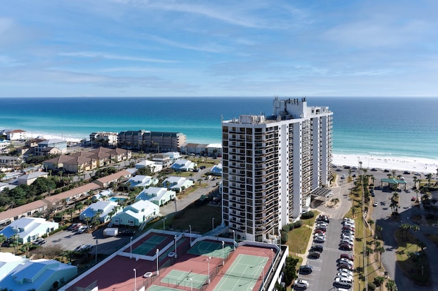 bird's eye view featuring a view of the beach and a water view