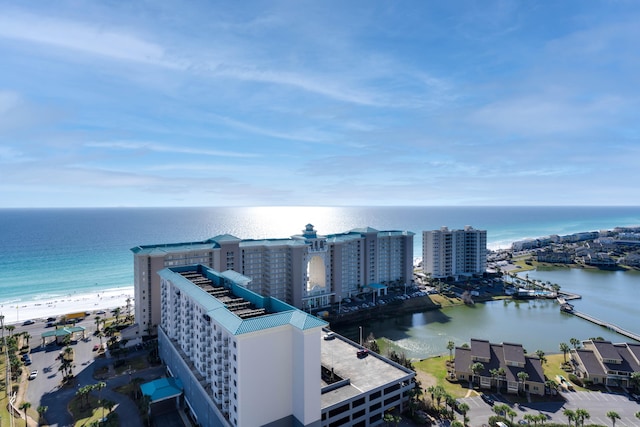 aerial view featuring a view of the beach and a water view