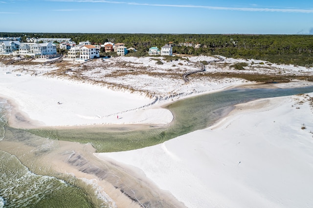 drone / aerial view with a view of the beach and a water view