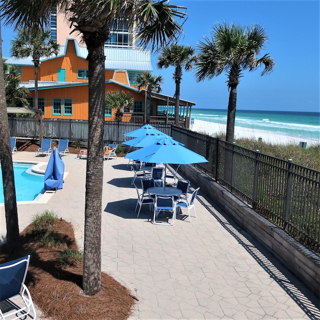 1751 Scenic Highway 98 Unit 614, Destin, FL 32541 - view of patio featuring a community pool and view of water and beach