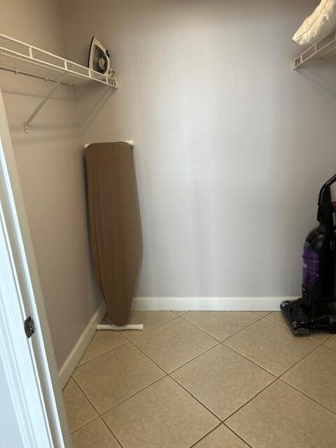 1751 Scenic Highway 98 Unit 614, Destin, FL 32541 - walk in closet featuring light tile patterned floors