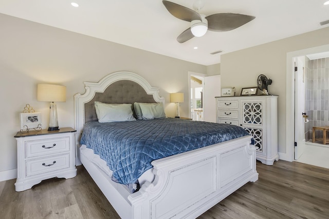 bedroom featuring ceiling fan and dark hardwood / wood-style floors