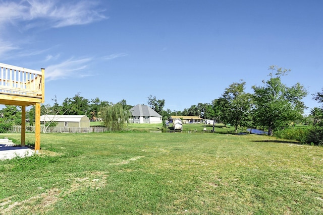 view of yard with a wooden deck