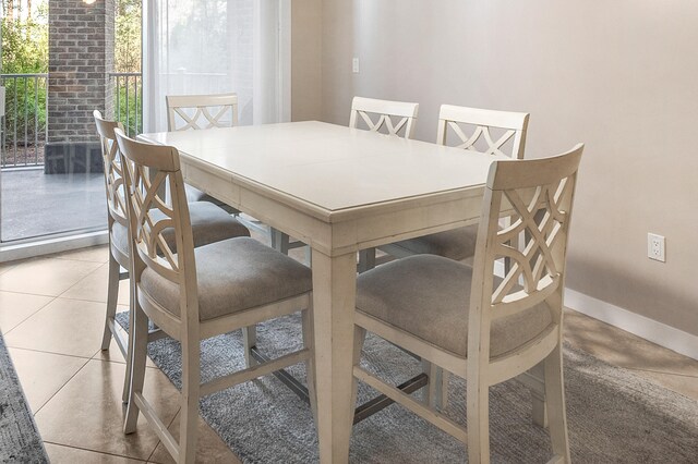 dining room with light tile patterned floors