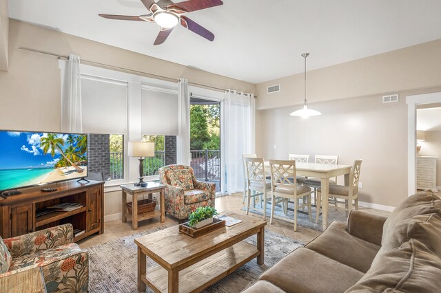 living room with ceiling fan