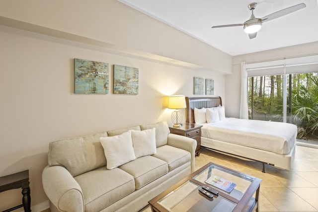 bedroom featuring ceiling fan, light tile patterned floors, and access to outside