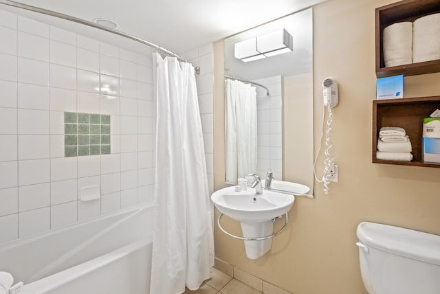 bathroom with tile patterned flooring, toilet, and shower / bathtub combination with curtain