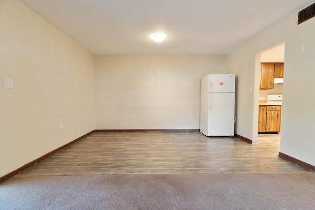 empty room featuring light wood-type flooring