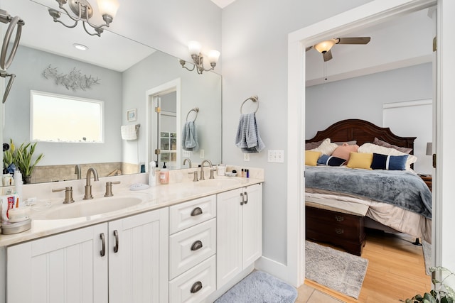 bathroom featuring wood-type flooring and vanity