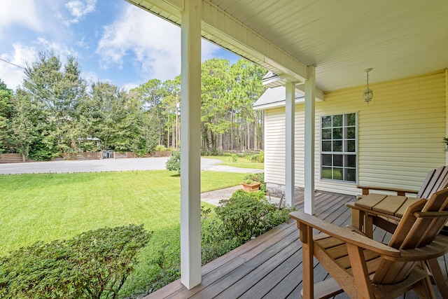 wooden deck with a yard