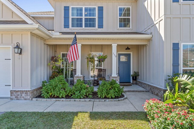 entrance to property with a porch