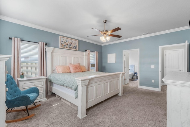 carpeted bedroom with crown molding and ceiling fan