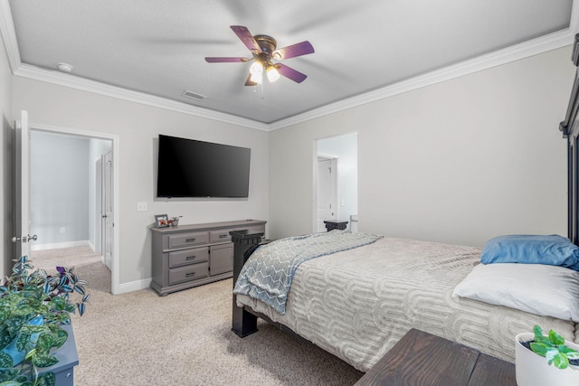 bedroom featuring light carpet, crown molding, and ceiling fan