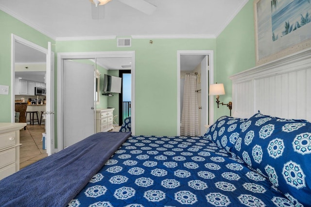 tiled bedroom with ceiling fan, a closet, ensuite bathroom, and crown molding