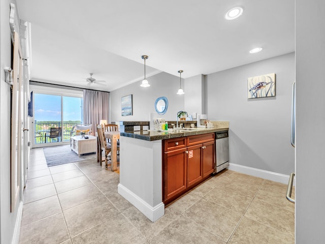 kitchen featuring kitchen peninsula, ceiling fan, decorative light fixtures, and dishwasher