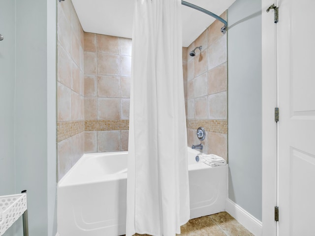 bathroom with shower / tub combo and tile patterned floors