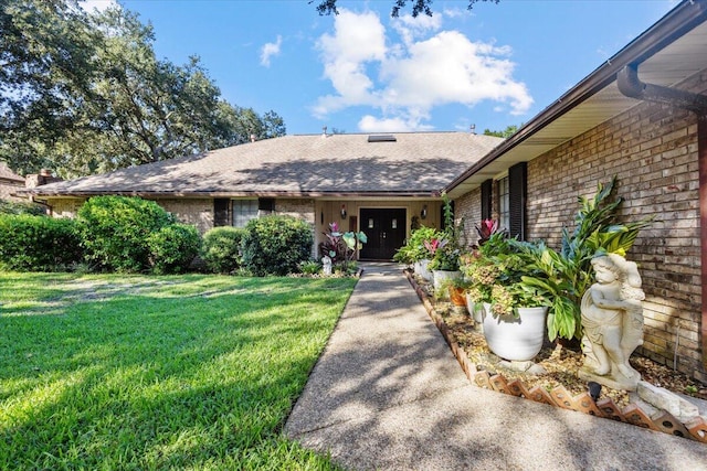 view of front of house with a front lawn