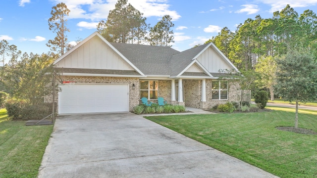 craftsman inspired home with a garage and a front lawn