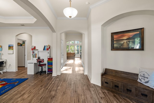 hallway featuring crown molding and dark hardwood / wood-style flooring