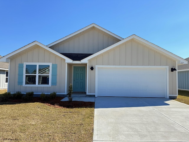 ranch-style house with driveway, an attached garage, board and batten siding, and a front yard