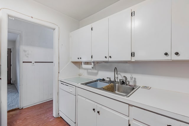 kitchen with dishwasher, light wood-type flooring, sink, and white cabinets