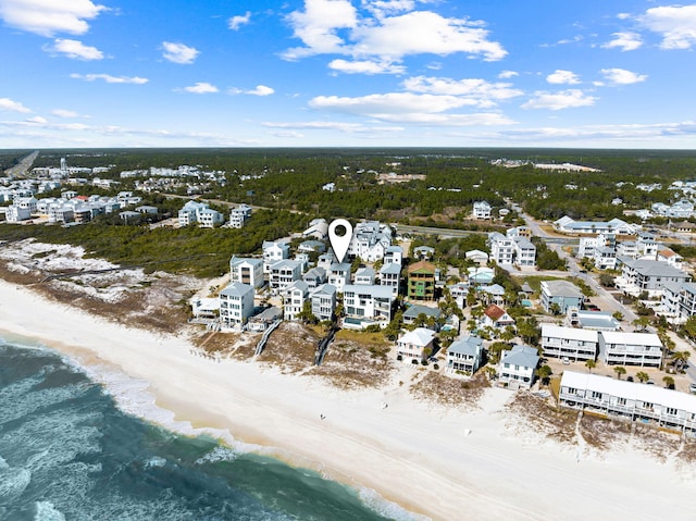 bird's eye view featuring a view of the beach and a water view